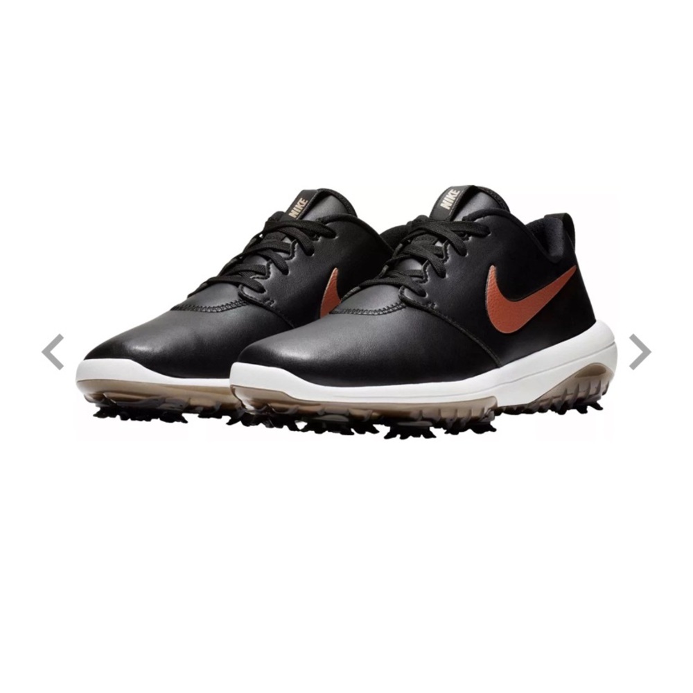 Womens black Nike golf shoes. Size 8. Rose gold Nike symbol- so pretty!!